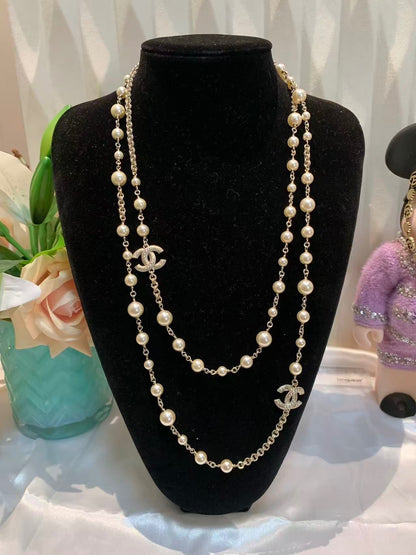 Long Pearl Strand Necklace with Iconic Logo Accents