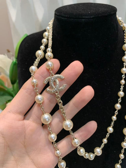 Long Pearl Strand Necklace with Iconic Logo Accents