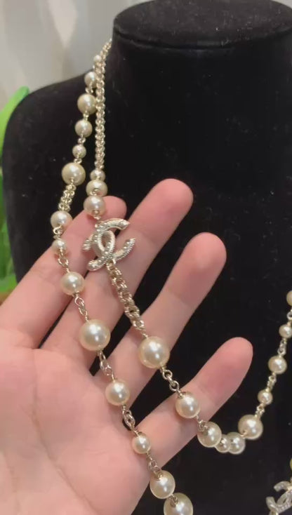 Long Pearl Strand Necklace with Iconic Logo Accents